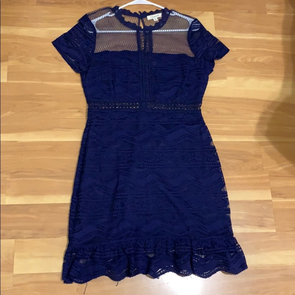Navy blue dress (hits above the knee)